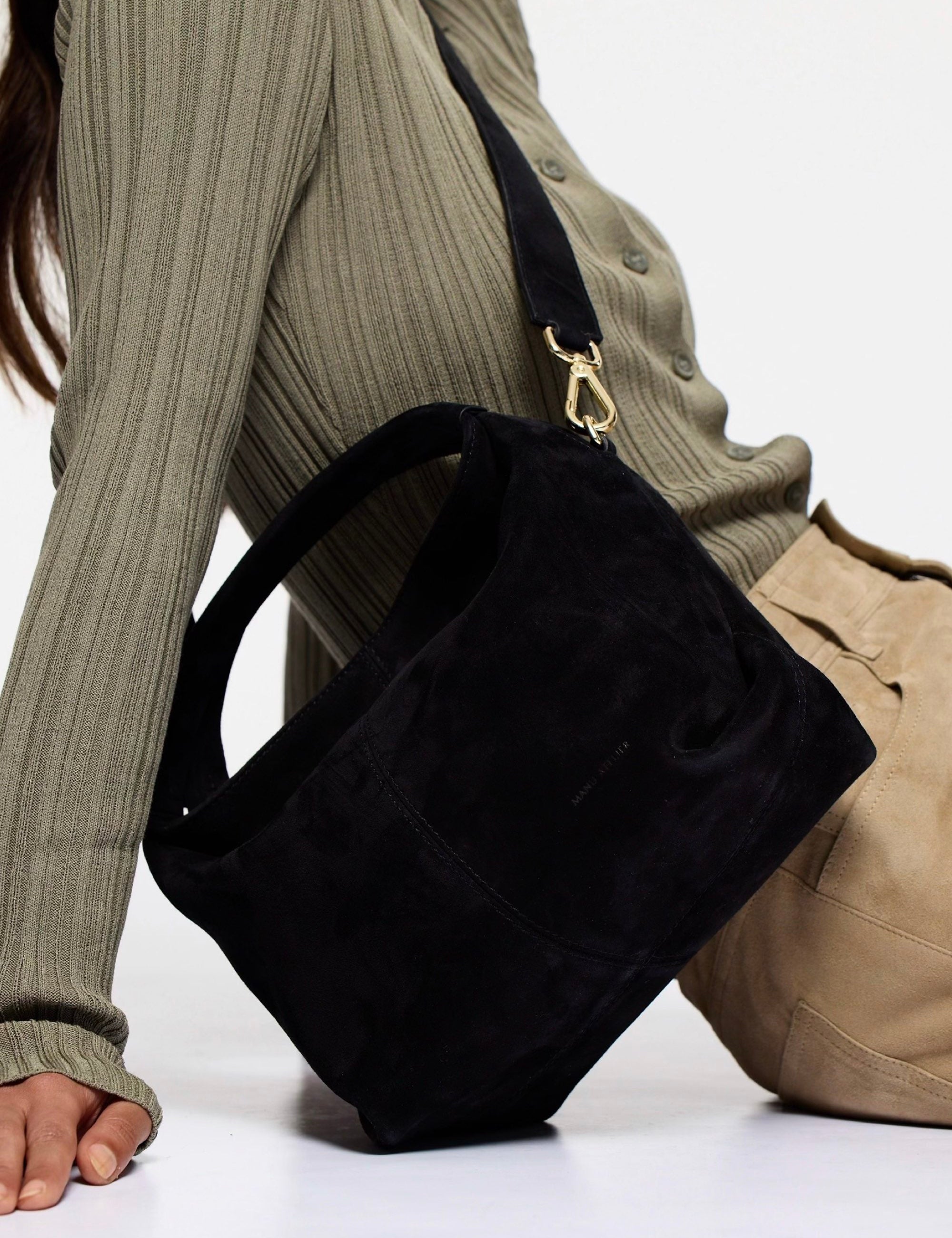 Mini Gala Suede Leather Black with a model